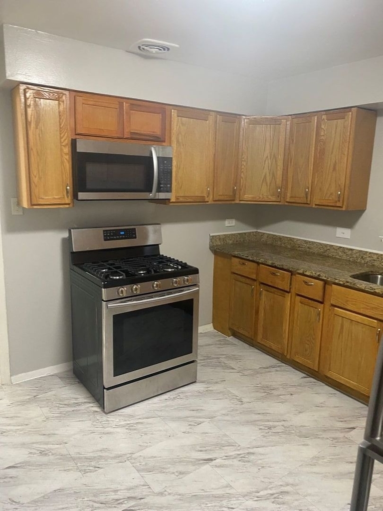 7637 S Essex Avenue - Photo 1