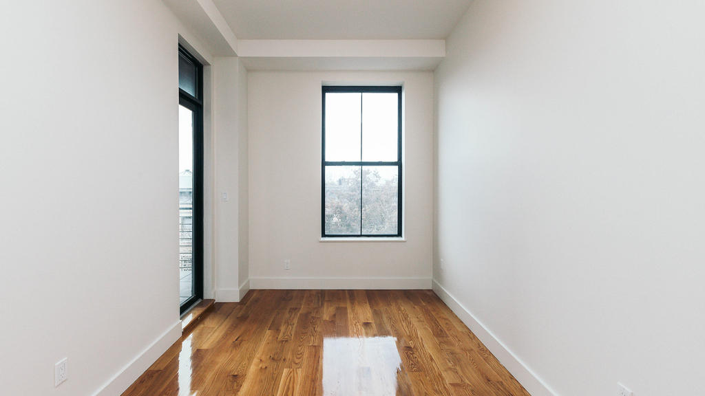 55-27 Myrtle Ave - Photo 16