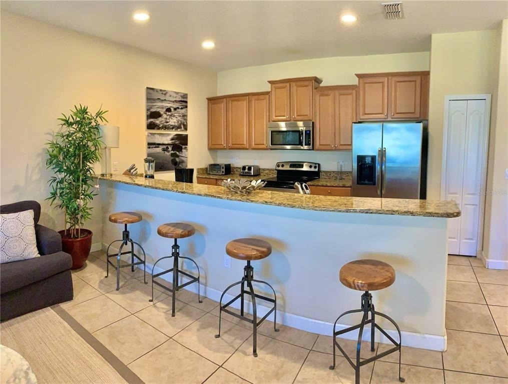 8921 Candy Palm Road - Photo 2