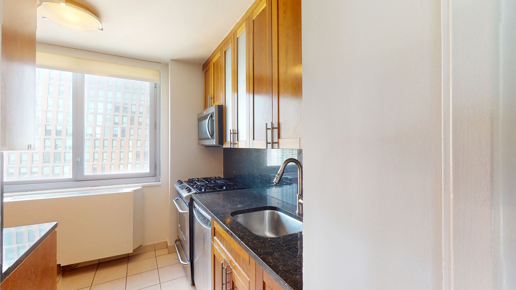 401 E 34th St - Photo 1