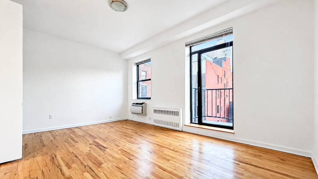 201 East 12th Street - Photo 0