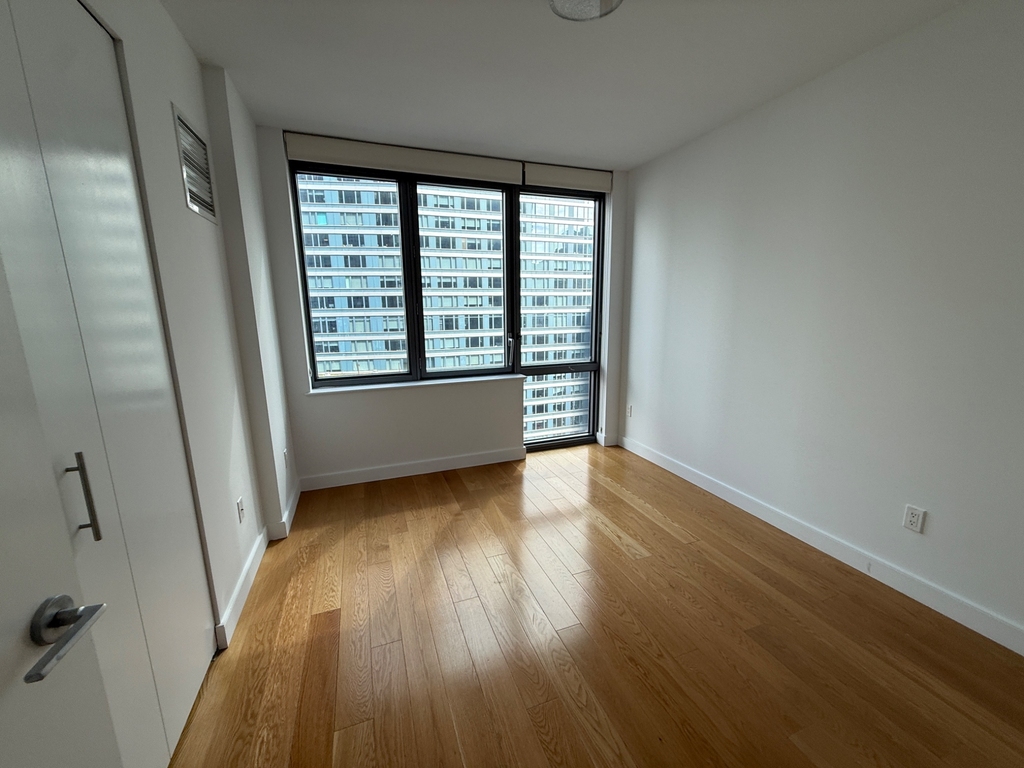 11th St & West 57th Street - Photo 5