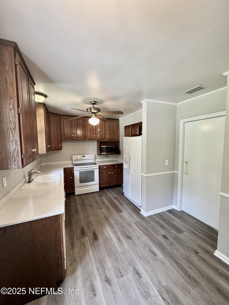 1692 E Holly Oaks Lake Road E - Photo 6