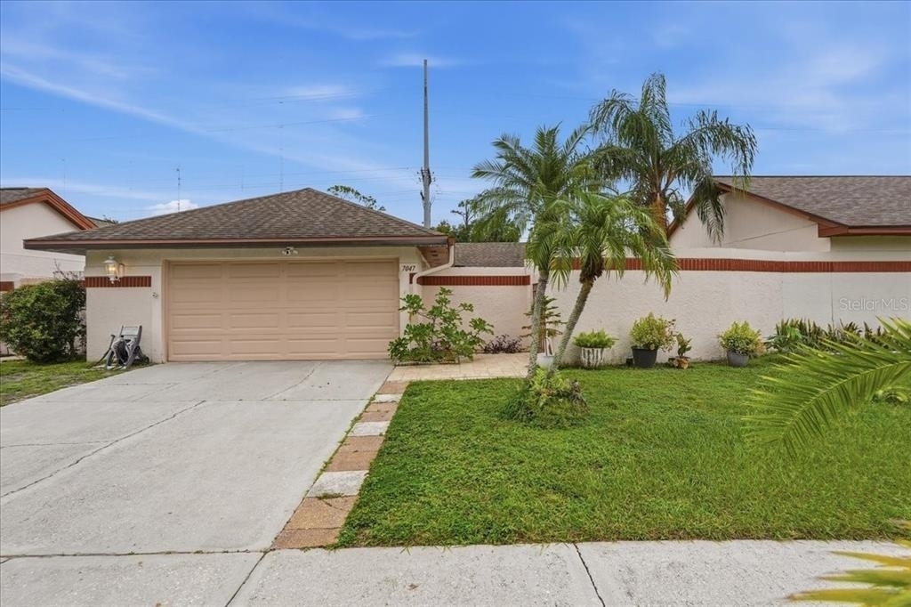 7047 Silvermill Drive - Photo 0