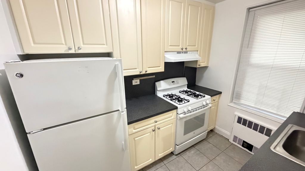 34-41 77th Street - Photo 0