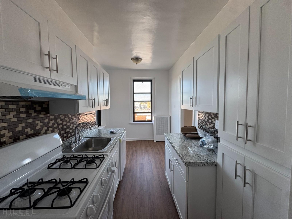 36-14 165th St - Photo 1