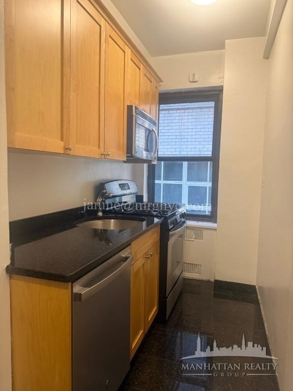 E 56th St - Photo 8