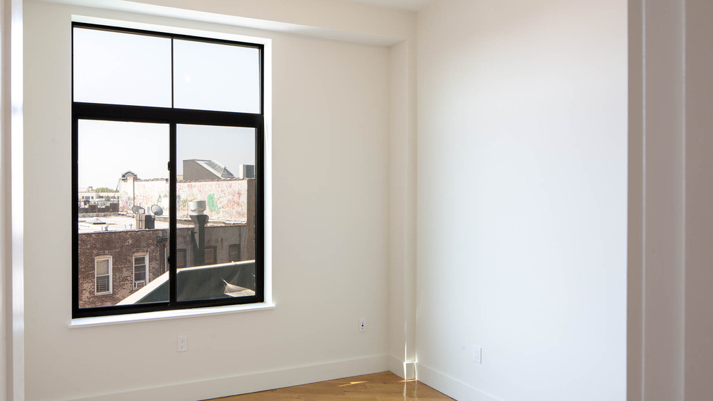 55-27 Myrtle Ave 11385 - Photo 12