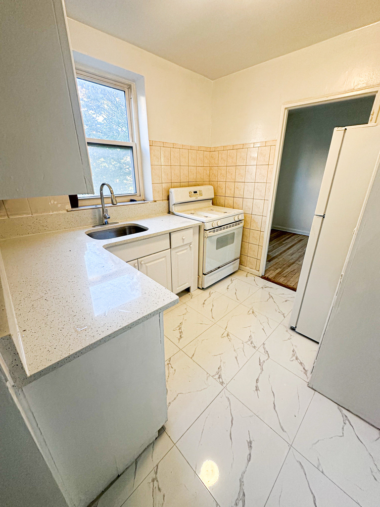85-11 34th Avenue - Photo 2