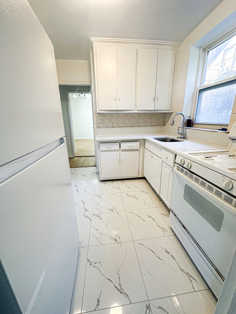 85-11 34th Avenue - Photo 1