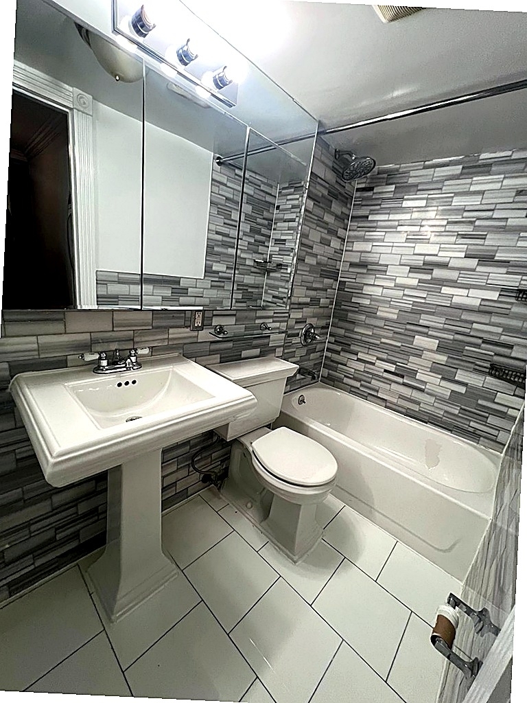 East 13th Street — 4 Bed - Photo 1
