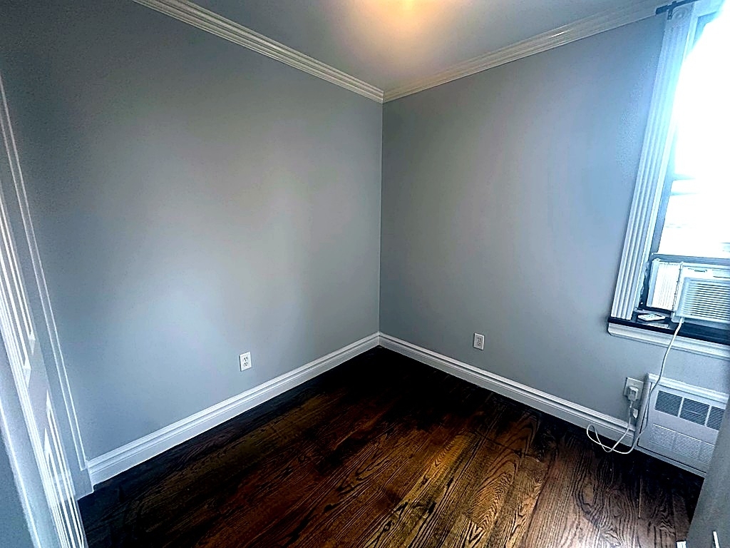 West 14th Street — 2 Bed - Photo 1