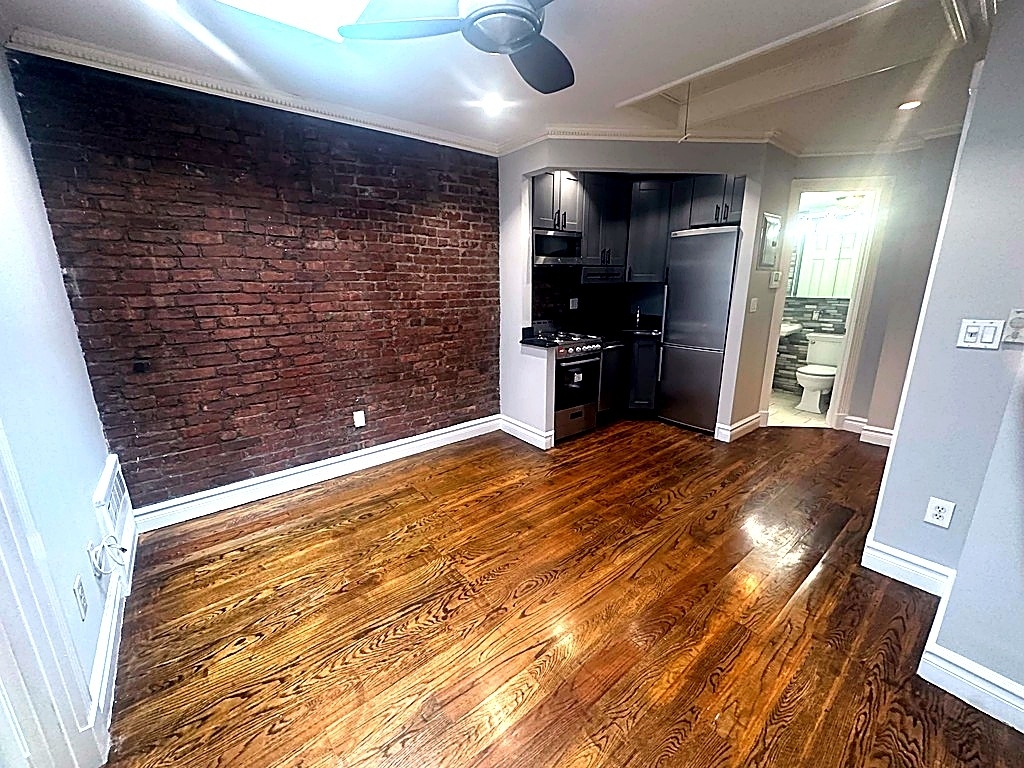 West 14th Street — 2 Bed - Photo 5