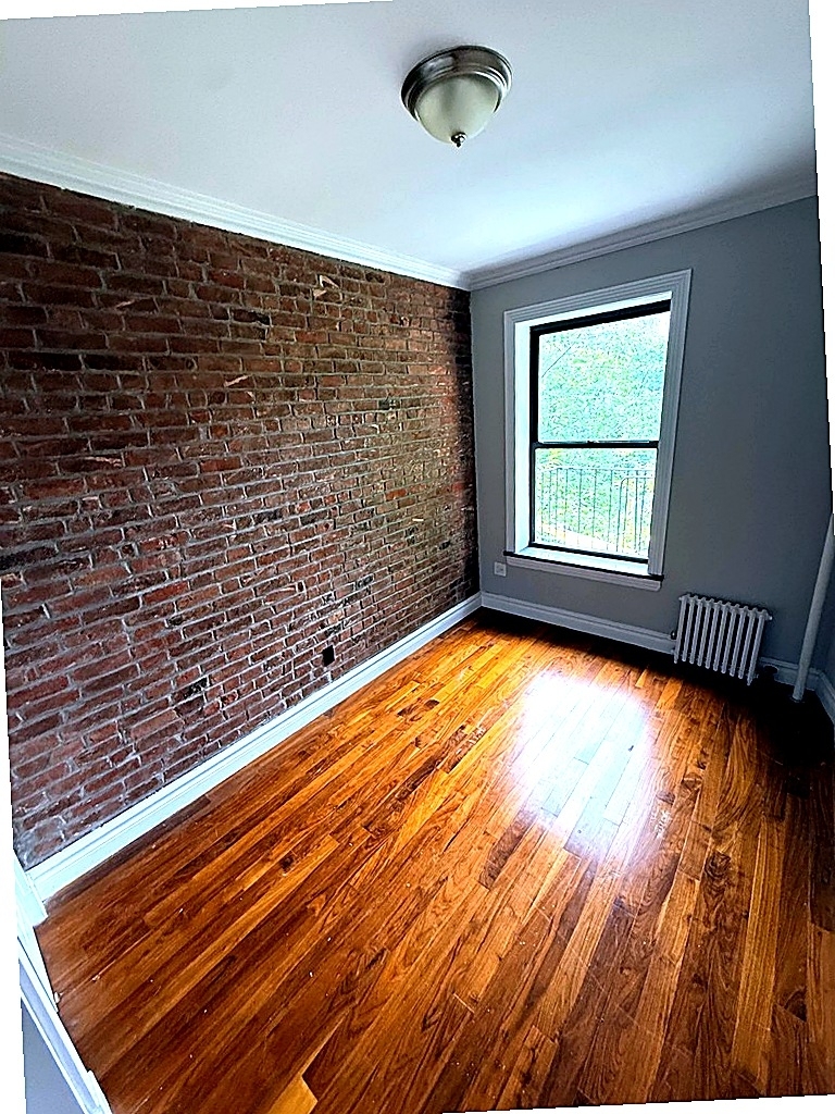 West 21st Street — 1 Bed - Photo 4