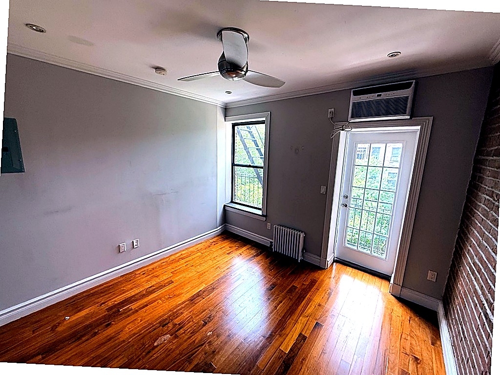 West 21st Street — 1 Bed - Photo 1
