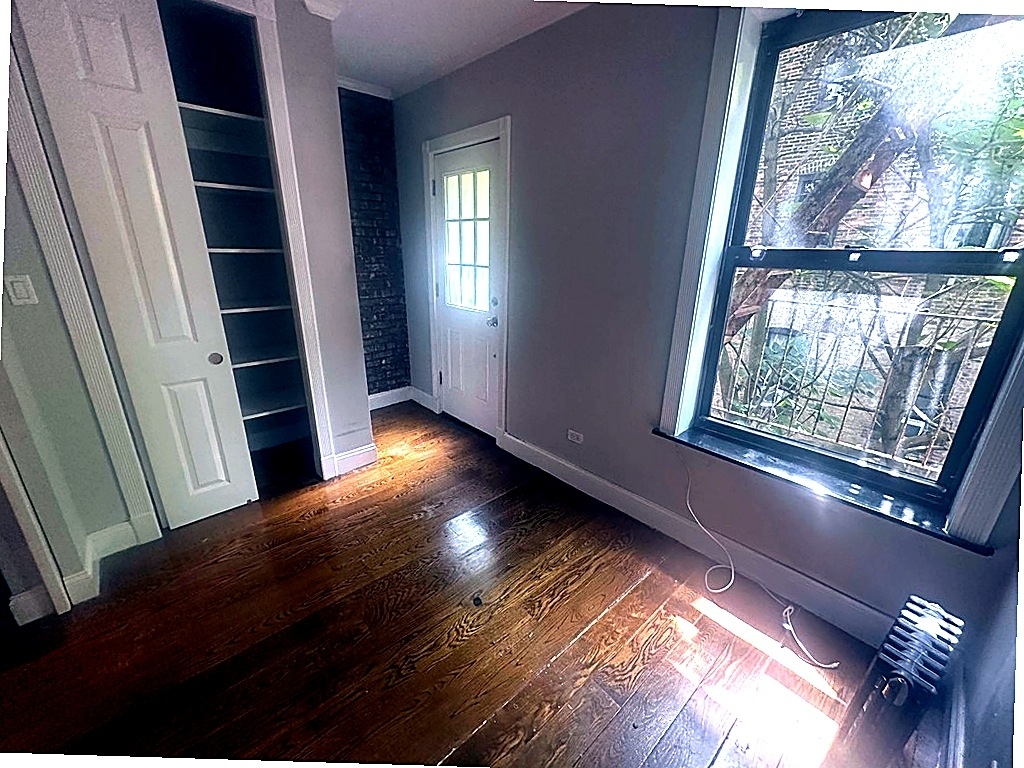 West 52nd Street — 3 Bed - Photo 2