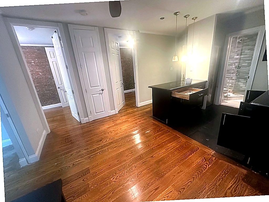 West 52nd Street — 3 Bed - Photo 1