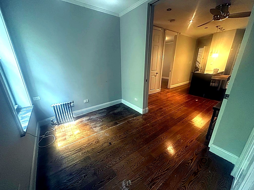 West 52nd Street — 3 Bed - Photo 3