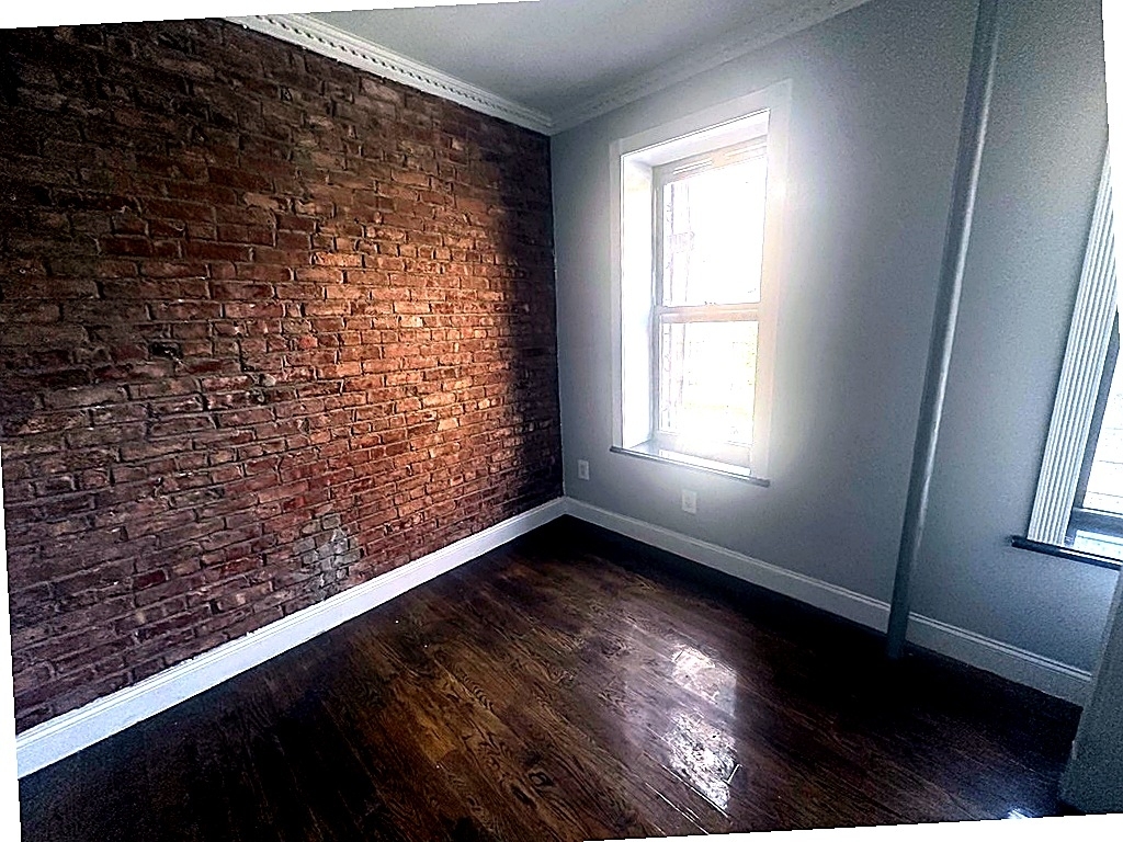 East 106th Street — 3 Bed - Photo 1