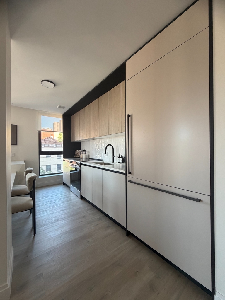 E 110th St - Photo 2