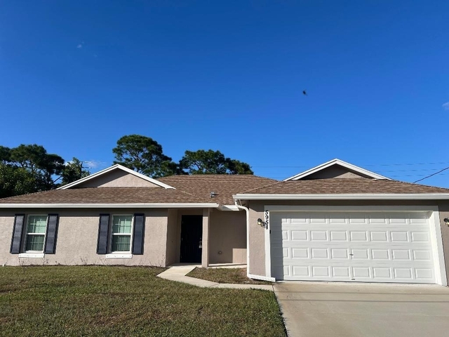 5951 Nw Baynard Drive - Photo 1