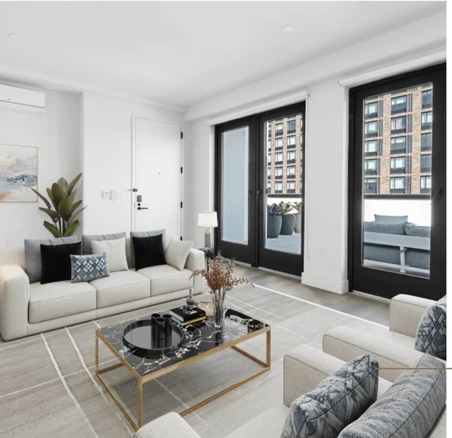 215 East 124th Street - Photo 1