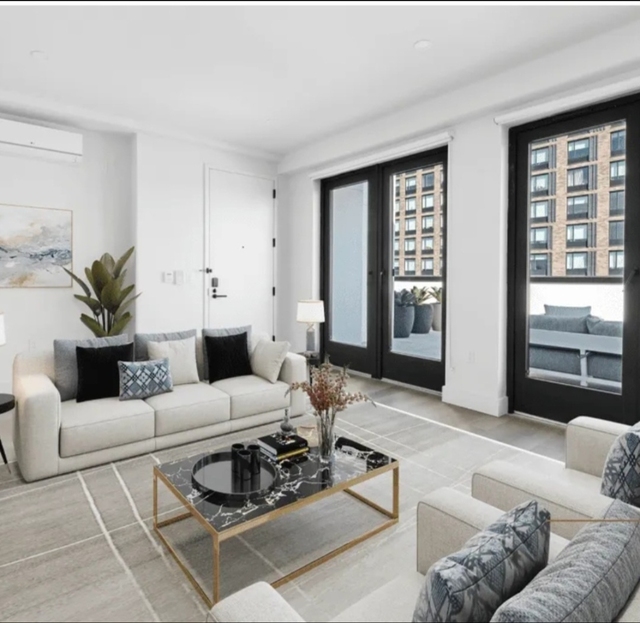 215 E 124th St - Photo 1