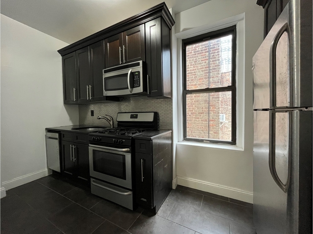 414 W 44th St - Photo 1
