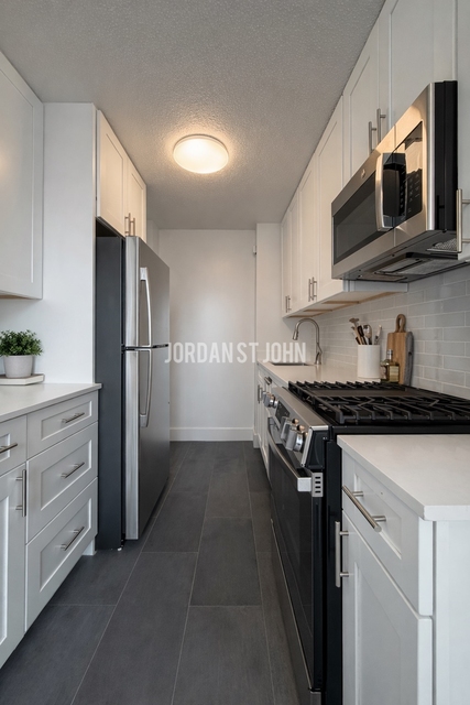 E 28TH ST - Photo 1