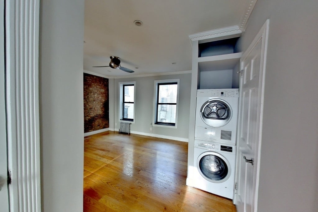 334 E 100th St - Photo 1
