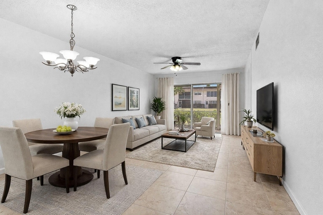 9855 Sandalfoot Boulevard - Photo 1