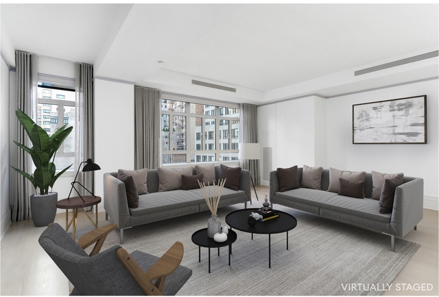 21 E 61st St - Photo 1