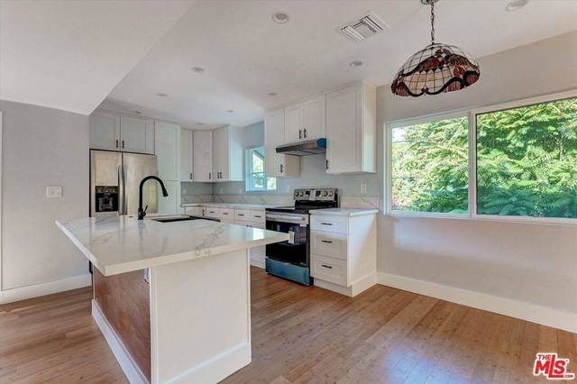 5726 Woodman Avenue - Photo 1