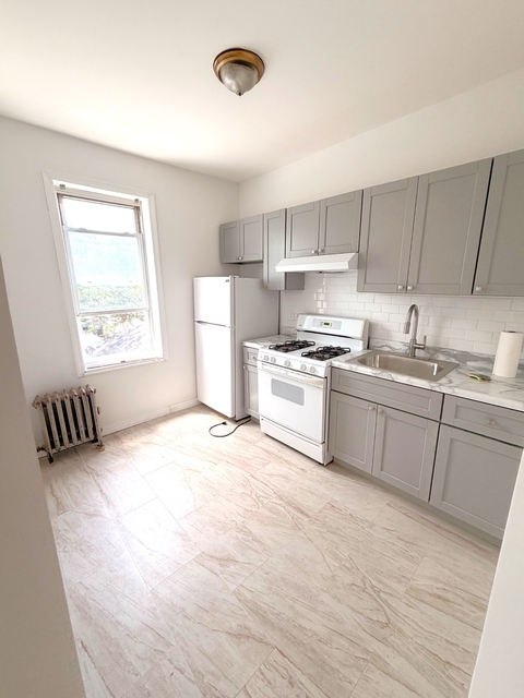 90-18 77th St - Photo 1