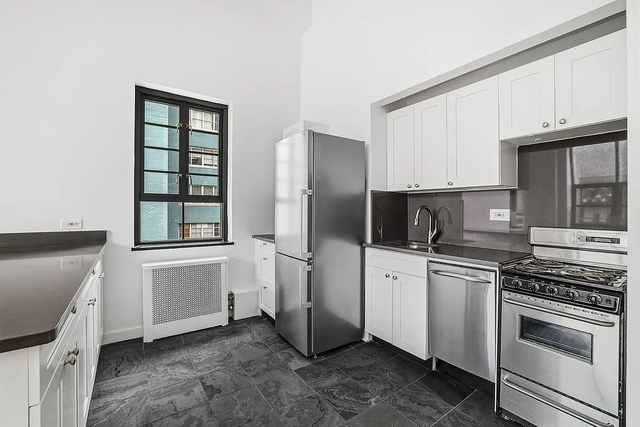 310 East 44th Street - Photo 1