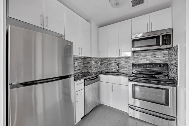419 E 117th Street - Photo 1