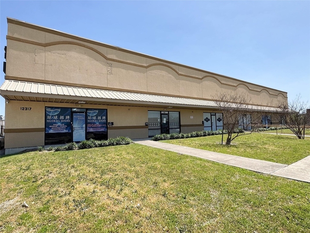 12317 Bellaire Boulevard - Photo 1