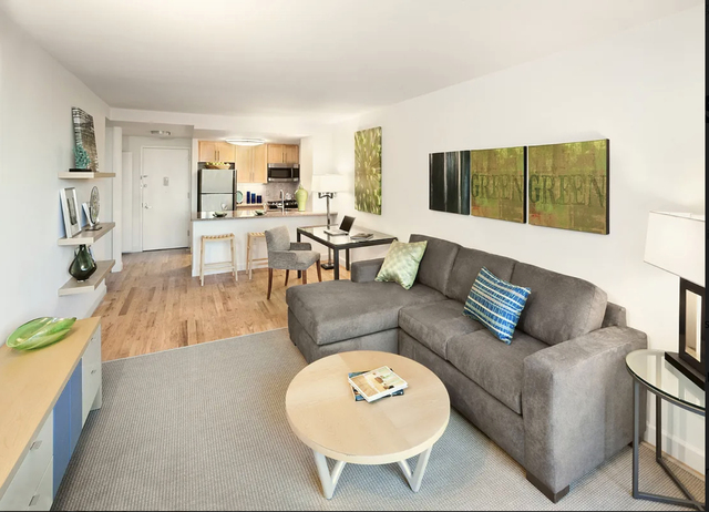 Copy of 245 East 124th Street, - Photo 1