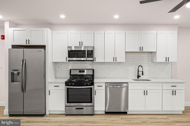 437 W Girard Avenue - Photo 1