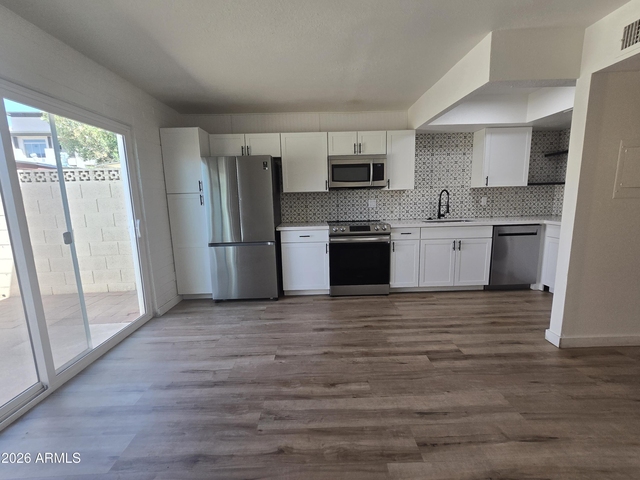 4848 N Woodmere Fairway -- - Photo 1
