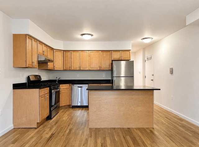 73-04 Ditmars Boulevard - Photo 1