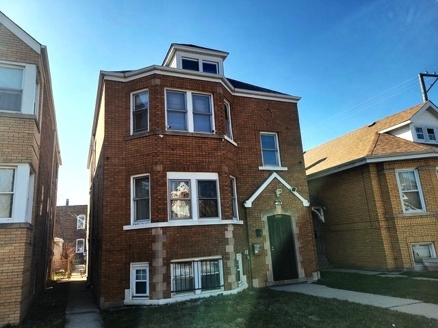 7050 S Maplewood Avenue - Photo 1