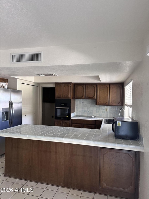 12114 E Victoria Street - Photo 1