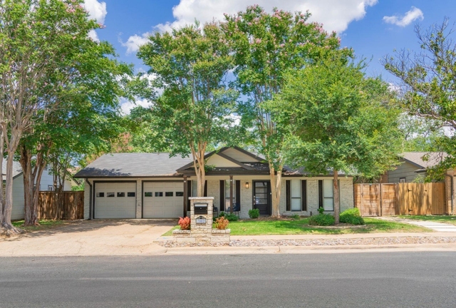 7002 Whispering Oaks Dr - Photo 1