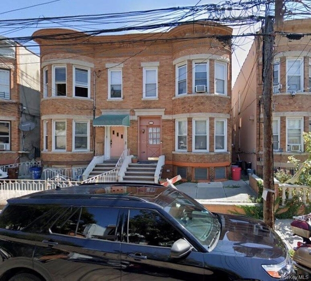 90-11 77th Street - Photo 1