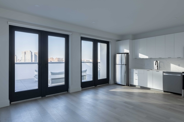 215 East 124th Street - Photo 1